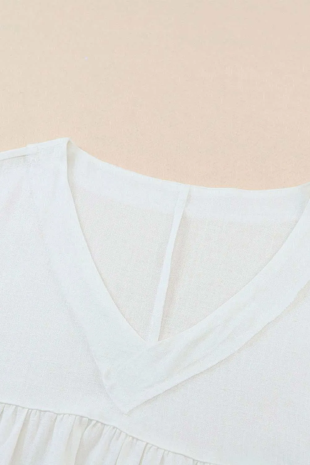 White Frayed V Neck Ruffled Babydoll Blouse